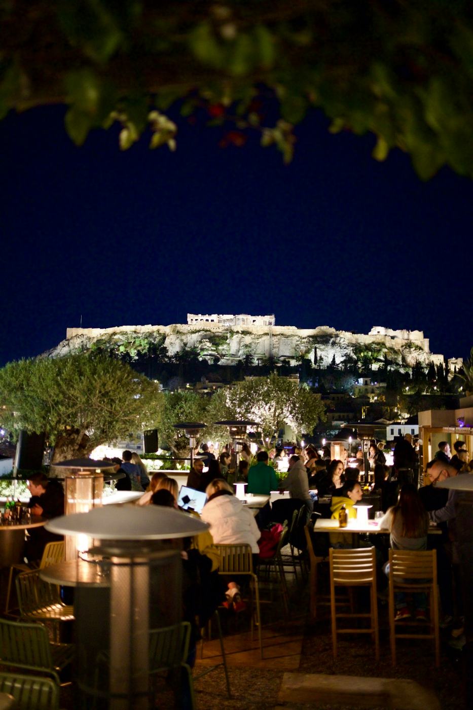 Dinner on a rooftop with the Acropolis lit up