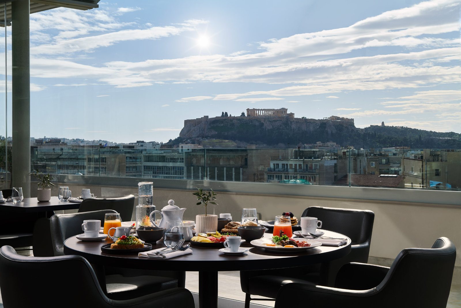 Breakfast on the hotel roof terrace with a view of the Acropolis, Athens