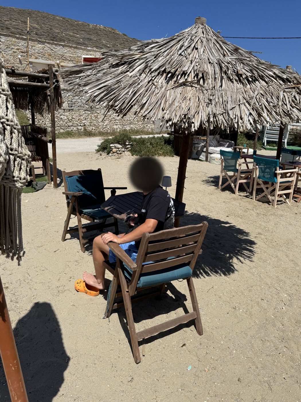 Shade under a straw umbrella
