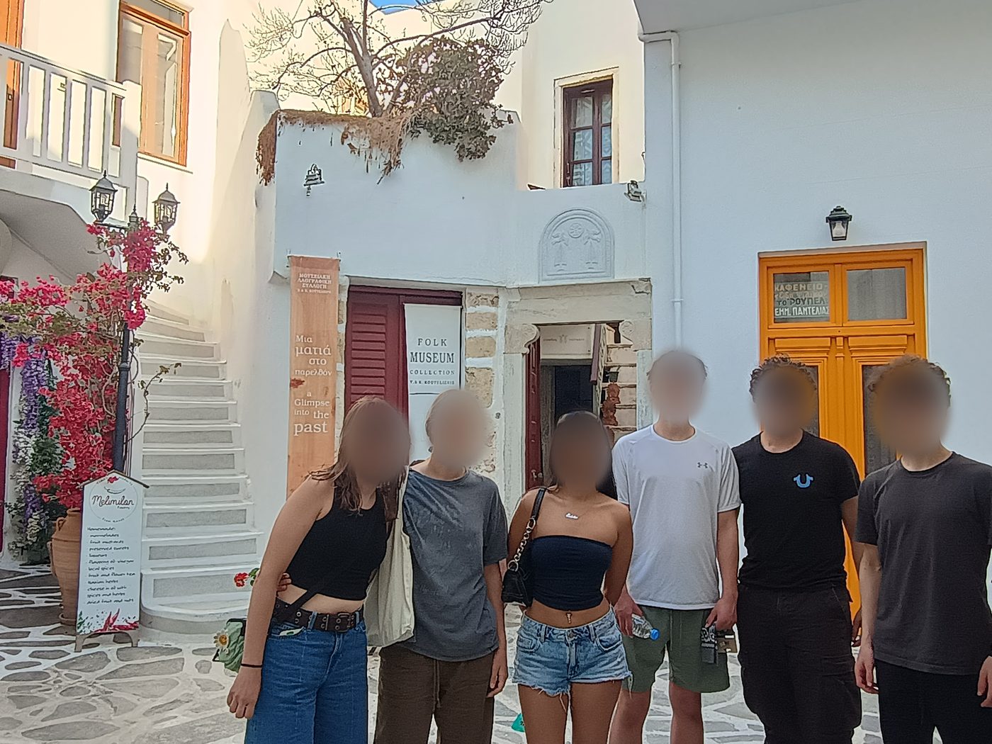 Students in the white lanes of the Kastro, outside the folk museum